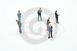 Miniature people businessmen standing on a Circle graphs of various skill levels. The concept used in selecting personnel to part