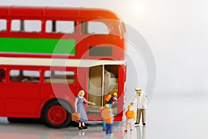 Miniature people, Children getting on the schoolbus with teacher