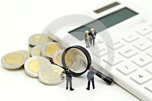 Miniature people : Couple oldman standing with Calculator and bu