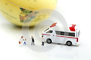 Miniature people : Doctor and patient with ambulance using for c