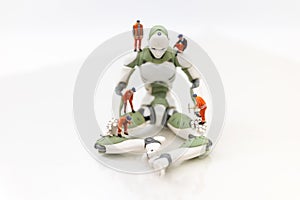 Miniature people : Engineering is developing an AI robot system, using labor instead of people. Image use for new technology in