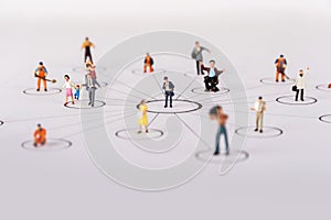 Miniature people family in diagrams