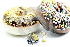 Miniature people : Fat oldman sitting on tape Measure with junkfood ,Healthcare and diet concept