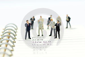 Miniature people, Group of businessmen work with team,