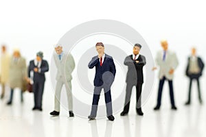 Miniature people, Group of businessmen work with team, using as background Choice of the best suited employee,