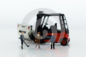 Miniature people : Group people auto insurance when an accident on the road. Image use for Make an agreement, responsibility