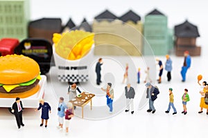 Miniature people: Group people talking about marketing, Trading business. Image use for Franchise business concept