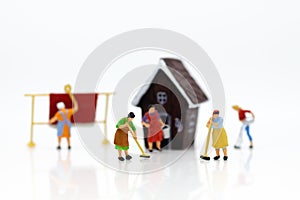 Miniature people: Housekeepers clean the house. Image use for cleaning occupations, business concept