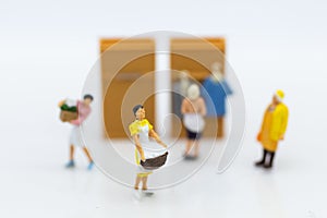 Miniature people : Housewives hire laundry - ironing, profitable business. Image use for housework, business concept