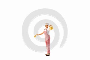 Miniature people, painter holding paint brush on white background with clipping path
