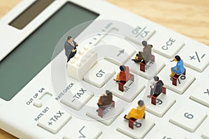 Miniature people Pay queue Annual income TAX for the year on c