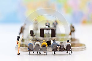 Miniature people: Recruiter interview applicants. Image use for background Choice of the best suited employee,