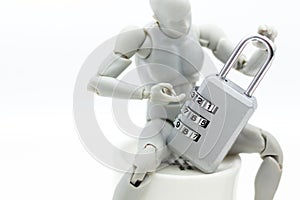 Miniature people: Robot model with master key encoding. Image use for background security system, hack, business concept