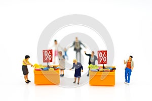Miniature people : Shoppers with discount for shopping items using as shopping business concept.