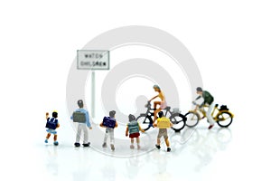Miniature people : student or children crossing road on way to s