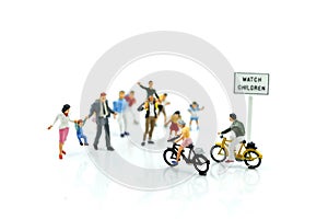 Miniature people : student or children crossing road on way to s