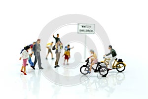 Miniature people : student or children crossing road on way to s