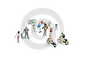 Miniature people : student or children crossing road on way to s