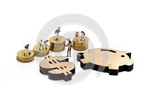 Miniature people : Student and Children with sign of dollar and