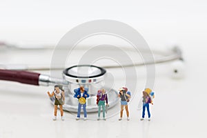 Miniature people: Travelers with pre-departure health check-ups. Image use for healthy , travel concept