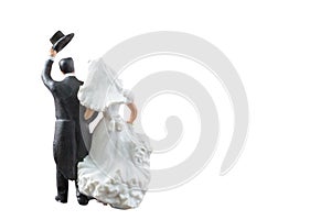 Miniature people wedding isolated on white background with clipping path