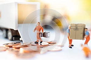 Miniature people : Worker move thing to destination place. Image use for logistic concept, shipment order from customer