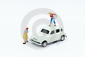 Miniature people : Workers make up the car. Image use for cleaning and maintenance, business autocar concept