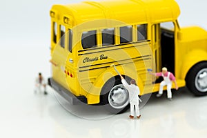 Miniature people : Workers make up the car. Image use for cleaning and maintenance, business autocar concept