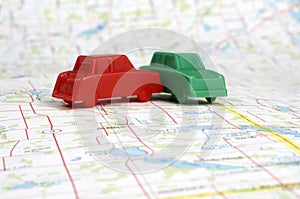 Miniature Plastic Cars On A Map