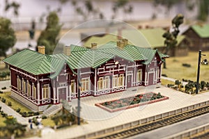 Miniature of railway station. Model of retro railroad station