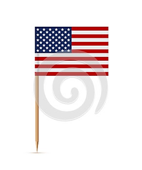 Miniature rectangle paper American flag on wooden stick or toothpick. Decoration for cupcake or other food. 4th of July