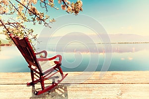 Miniature of a Rocking Chair in front of a lagoon, symbolizing r