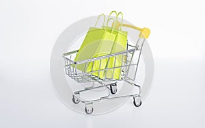 Miniature shopping cart with bags or paper