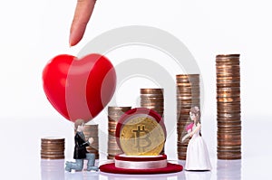 Miniature small doll of couple lovers propose for marriage with romantic valentine moment with background of stack coin as saving