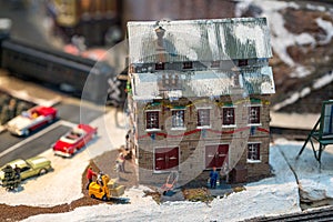Miniature toy factory covered in snow
