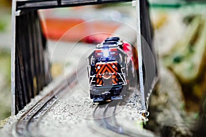 Miniature toy model train locomotives on display