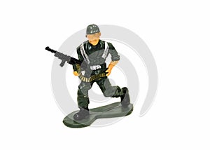 Miniature toy soldier on white background, close-up