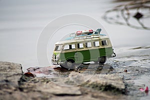 miniature volkswagen van in outdoor in border the river - Travel concept