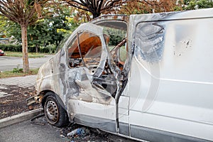 Minibus after a fire, burnt body and interior of the car. Burnt rusty car after fire or accident. Car after the fire