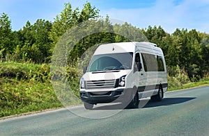 Minibus goes on the country highway