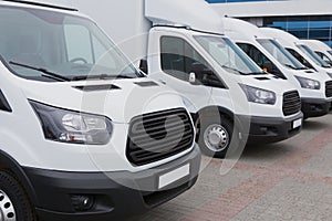 minibuses and vans outside