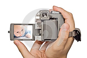 MiniDv camera in man hands photo
