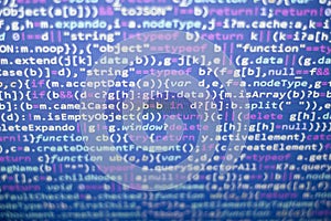 Minificated javascript code. Computer programming source code abstract screen of web developer.
