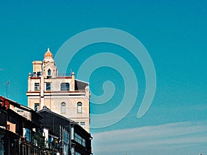 Minimal Blue Sky Background with Clean Gradient Atmosphere and Tiny Distant Bird in Calm Open Space