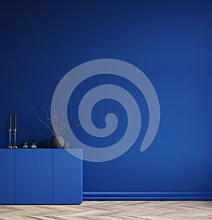 Minimal decorated dark deep blue room with chest of drawers and vase with branch