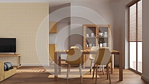 Minimal dining and living room in white and yellow tones. Wooden table with chairs, partition wall with wallpaper over