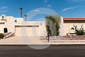 Minimal drought resistant water wise landscape in a Santa Fe Style townhome