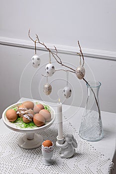 Minimal Easter Table Decor with Eggs, Branches and Candle