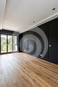 Minimal empty room with black wall photo