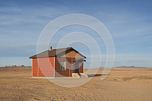 Minimal house in a desert photo